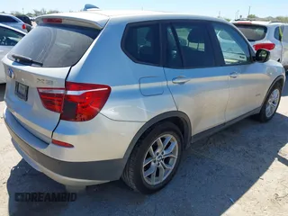 2013 BMW X3 xDrive28i with VIN 5UXWX9C53D0A31087, listed as a IAAI auction lot 41850886 with 142,156 mi miles. Bid and sale history available at carsss.com. Image 4.
