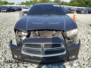 2014 Dodge Charger SXT z VIN 2C3CDXHG1EH315764, wystawiony jako Copart lot #57605135 z przebiegiem 273 912 mil mil oraz Szkoda całkowita • Salvage title. Historia ofert i sprzedaży dostępna na DreamBid. Obrazek 5.