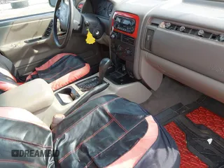 2001 Jeep Grand Cherokee Laredo with VIN 1J4GX48SX1C522670, listed as a IAAI auction lot 42111708 with Not provided miles and . Bid and sale history available at DreamBid. Image 5.