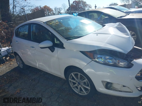 2019 Ford Fiesta SE with VIN 3FADP4EJ9KM123940, listed as a IAAI auction lot 40980644 with 102,240 mi miles. Bid and sale history available at carsss.com. Image 13.