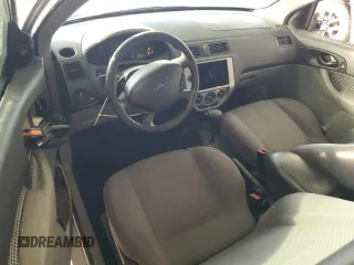 2007 Ford Focus S with VIN 1FAFP31N47W129857, listed as a Copart auction lot 51449645 with 146,360 mi miles and Salvage Title. Bid and sale history available at DreamBid. Image 8.