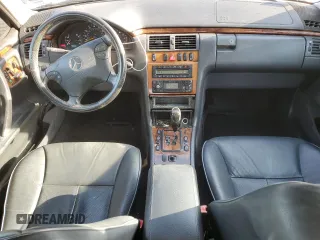 2002 Mercedes-Benz E-Class with VIN WDBJF65J22B490275, listed as a Copart auction lot 51128565 with 142,232 mi miles and Salvage Title. Bid and sale history available at carsss.com. Image 8.
