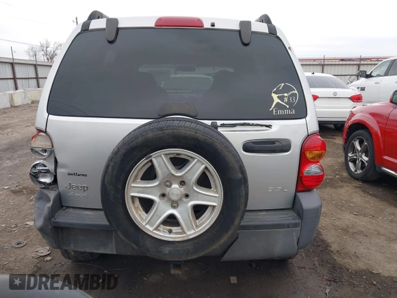 2004 Jeep Liberty Sport with VIN 1J4GL48K74W318861, listed as a IAAI auction lot 41706222 with 211,089 mi miles. Bid and sale history available at carsss.com. Image 16.