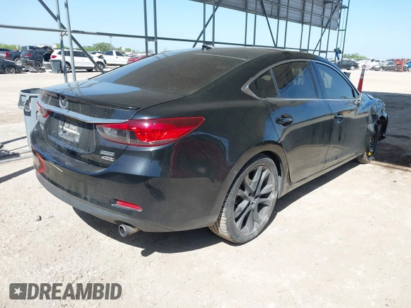 2015 Mazda 6 i Grand Touring with VIN JM1GJ1W59F1179548, listed as a IAAI auction lot 42004860 with 153,532 mi miles and . Bid and sale history available at DreamBid. Image 4.