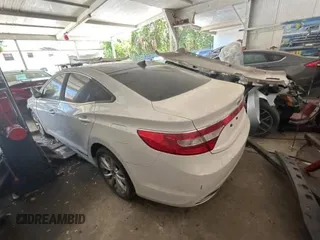 2013 Hyundai Azera с VIN KMHFG4JG4DA283684, выставлен на аукционе Copart как лот 62190285 с пробегом 58 994 миль миль и Чистый • Clean title. История ставок и продаж доступна на DreamBid. Изображение 3.