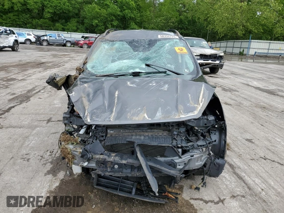 2017 Ford Escape SE z VIN 1FMCU9GD7HUB76204, wystawiony jako Copart lot #58334725 z przebiegiem Nie podano mil oraz Szkoda całkowita • Salvage title. Historia ofert i sprzedaży dostępna na DreamBid. Obrazek 5.