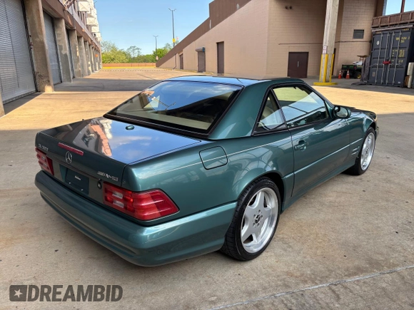 2002 Mercedes-Benz SL 500 with VIN WDBFA68F42F204673, listed as a Copart auction lot 56757525 with 32,967 mi miles and Clean title. Bid and sale history available at DreamBid. Image 4.