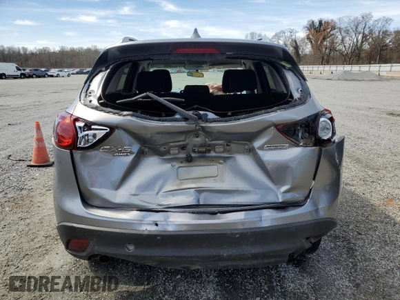 2014 Mazda CX-5 Touring with VIN JM3KE4CY1E0365787, listed as a Copart auction lot 49103355 with 144,031 mi miles and Salvage Title. Bid and sale history available at carsss.com. Image 6.