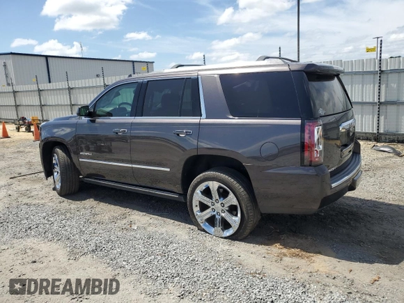 2017 GMC Yukon Denali with VIN 1GKS2CKJ3HR360319, listed as a Copart auction lot 70051014 with 127,896 mi miles and Salvage Title. Bid and sale history available at carsss.com. Image 2.