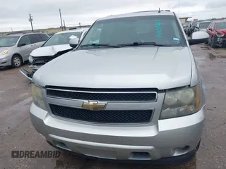 2011 Chevrolet Suburban LS with VIN 1GNSCHE06BR188407, listed as a IAAI auction lot 41453215 with 232,667 mi miles. Bid and sale history available at carsss.com. Image 12.