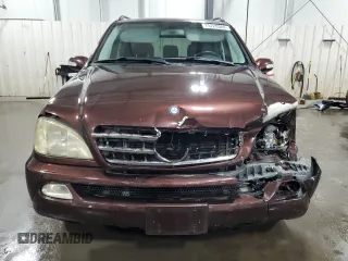 2002 Mercedes-Benz M-Class with VIN 4JGAB75E72A323840, listed as a Copart auction lot 75729384 with 122,811 mi miles and Salvage Title. Bid and sale history available at carsss.com. Image 5.