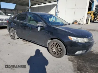 2012 Kia Forte SX with VIN KNAFW4A33C5595200, listed as a Copart auction lot 43067825 with 147,022 mi miles and Salvage Title. Bid and sale history available at carsss.com. Image 4.