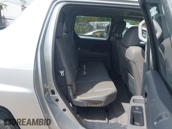 2014 Honda Ridgeline RTL with VIN 5FPYK1F53EB013752, listed as a IAAI auction lot 41886851 with 89,038 mi miles and . Bid and sale history available at DreamBid. Image 8.