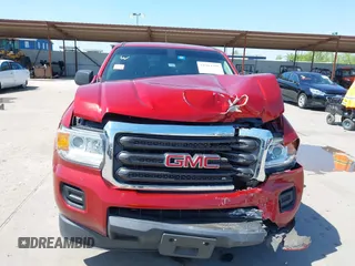 2016 GMC Canyon 2WD z VIN 1GTH5BEA8G1367539, wystawiony jako IAAI lot #41984288 z przebiegiem 111 878 mil mil oraz . Historia ofert i sprzedaży dostępna na DreamBid. Obrazek 13.