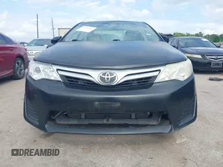 2014 Toyota Camry L with VIN 4T1BF1FK8EU468379, listed as a IAAI auction lot 42134387 with 101,603 mi miles and . Bid and sale history available at DreamBid. Image 6.