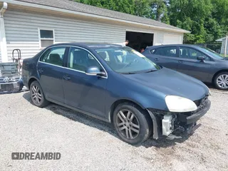 2006 Volkswagen Jetta z VIN 3VWSG81K76M670201, wystawiony jako IAAI lot #42390643 z przebiegiem 90 794 mil mil oraz . Historia ofert i sprzedaży dostępna na DreamBid. Obrazek 1.