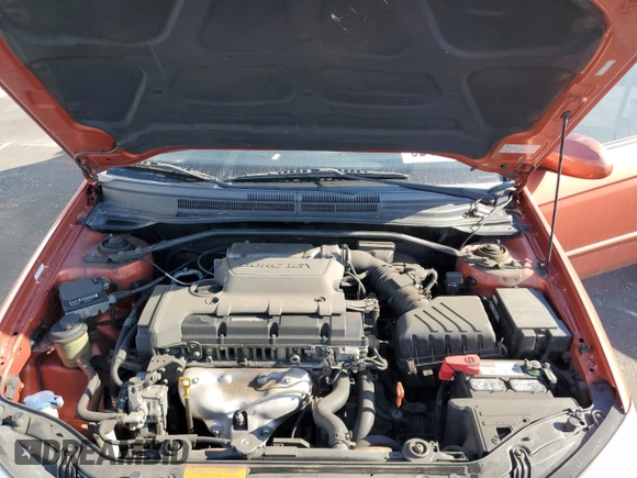 2009 Kia Spectra EX with VIN KNAFE222995027376, listed as a Copart auction lot 52406025 with 73,692 mi miles and Salvage Title. Bid and sale history available at DreamBid. Image 11.