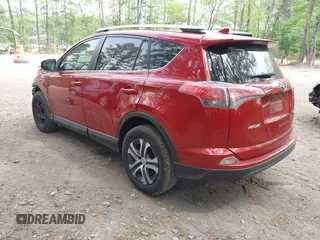 2016 Toyota RAV4 LE with VIN JTMZFREV4GJ062701, listed as a IAAI auction lot 42084694 with 121,553 mi miles and . Bid and sale history available at DreamBid. Image 3.