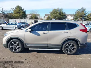 2017 Honda CR-V Touring with VIN 5J6RW2H94HL013536, listed as a IAAI auction lot 41577317 with 97,132 mi miles. Bid and sale history available at carsss.com. Image 14.