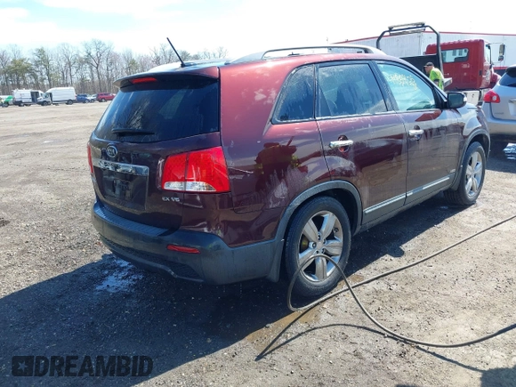 2012 Kia Sorento EX with VIN 5XYKUDA22CG293371, listed as a IAAI auction lot 41869105 with 69,842 mi miles. Bid and sale history available at carsss.com. Image 4.