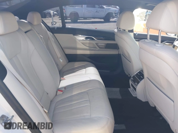 2019 BMW 7 Series 740i with VIN WBA7E2C53KB454816, listed as a IAAI auction lot 42539294 with 73,363 mi miles and . Bid and sale history available at DreamBid. Image 8.