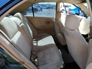 2001 Mitsubishi Mirage ES z VIN JA3AY26C11U002651, wystawiony jako Copart lot #55161755 z przebiegiem 209 883 mil mil oraz Szkoda całkowita • Salvage title. Historia ofert i sprzedaży dostępna na DreamBid. Obrazek 10.