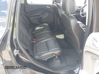 2014 Ford Escape Titanium with VIN 1FMCU9JX2EUB66579, listed as a IAAI auction lot 42171374 with 131,485 mi miles. Bid and sale history available at carsss.com. Image 8.