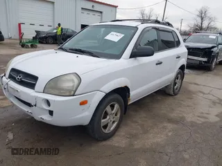 2006 Hyundai Tucson GL with VIN KM8JM12BX6U467288, listed as a IAAI auction lot 41679827 with 146,973 mi miles. Bid and sale history available at carsss.com. Image 18.