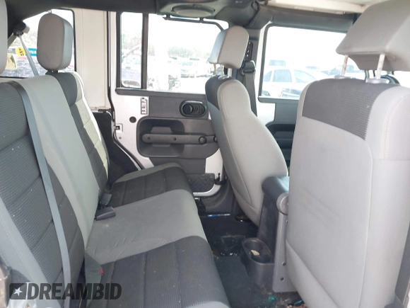 2007 Jeep Wrangler Unlimited X with VIN 1J4GB39147L199367, listed as a IAAI auction lot 40897772 with 229,309 mi miles and . Bid and sale history available at DreamBid. Image 8.