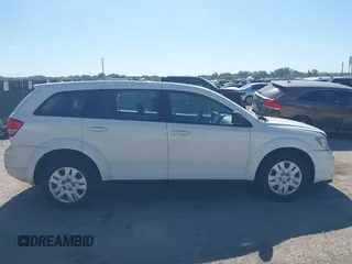 2014 Dodge Journey SE with VIN 3C4PDCAB2ET258681, listed as a IAAI auction lot 42558132 with 136,569 mi miles and . Bid and sale history available at DreamBid. Image 13.