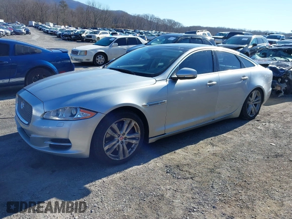 2014 Jaguar XJ z VIN SAJWJ1CD0E8V63989, wystawiony jako IAAI lot #41643513 z przebiegiem 119 924 mil mil oraz . Historia ofert i sprzedaży dostępna na DreamBid. Obrazek 20.