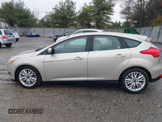 2017 Ford Focus Titanium with VIN 1FADP3N26HL207100, listed as a IAAI auction lot 41865961 with 220,850 mi miles and . Bid and sale history available at carsss.com. Image 14.