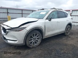 2019 Mazda CX-5 Grand Touring with VIN JM3KFBDM9K0697467, listed as a IAAI auction lot 41940364 with 62,015 mi miles. Bid and sale history available at carsss.com. Image 2.