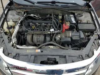 2012 Ford Fusion SEL z VIN 3FAHP0JA2CR232860, wystawiony jako Copart lot #57754735 z przebiegiem 234 638 mil mil oraz Szkody całkowita. Historia ofert i sprzedaży dostępna na DreamBid. Obrazek 11.