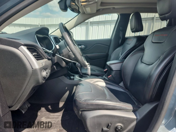 2014 Jeep Cherokee Trailhawk с VIN 1C4PJMBS1EW212024, выставлен на аукционе Copart как лот 58825265 с пробегом 99 087 миль миль и Списание • Salvage title. История ставок и продаж доступна на DreamBid. Изображение 7.