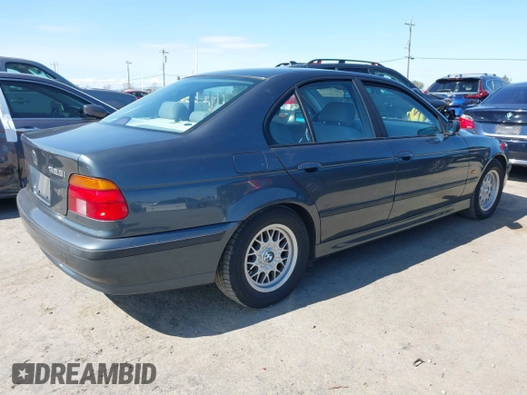 2000 BMW 5 Series 528iA with VIN WBADM6343YGV01651, listed as a IAAI auction lot 41745574 with 143,898 mi miles. Bid and sale history available at carsss.com. Image 4.