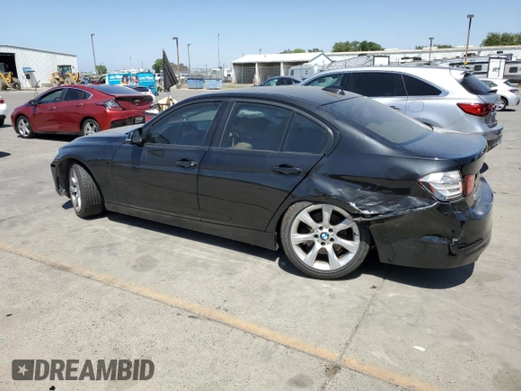 2013 BMW 3 Series 335i xDrive with VIN WBA3B9C51DF587019, listed as a Copart auction lot 59373025 with 118,723 mi miles and Salvage title. Bid and sale history available at DreamBid. Image 2.