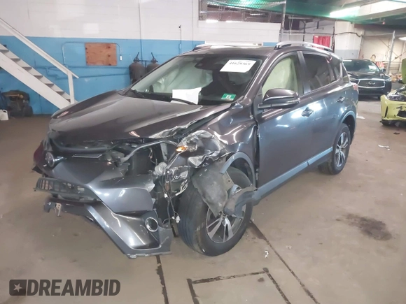 2018 Toyota RAV4 XLE with VIN JTMRFREV8JJ208377, listed as a IAAI auction lot 41629369 with 160,870 mi miles. Bid and sale history available at carsss.com. Image 17.