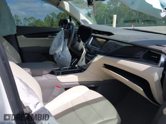 2023 Cadillac XT6 FWD Premium Luxury with VIN 1GYKPCRS3PZ186210, listed as a IAAI auction lot 42290027 with 44,117 mi miles and . Bid and sale history available at DreamBid. Image 5.