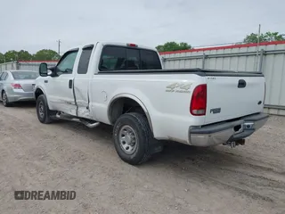 2001 Ford Super Duty F-250 XL with VIN 1FTNX21LX1EA76318, listed as a IAAI auction lot 41878833 with 191,897 mi miles. Bid and sale history available at carsss.com. Image 3.