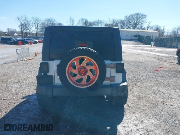 2016 Jeep Wrangler Unlimited Rubicon Hard Rock with VIN 1C4HJWFG9GL296782, listed as a IAAI auction lot 41595273 with 113,338 mi miles. Bid and sale history available at carsss.com. Image 16.