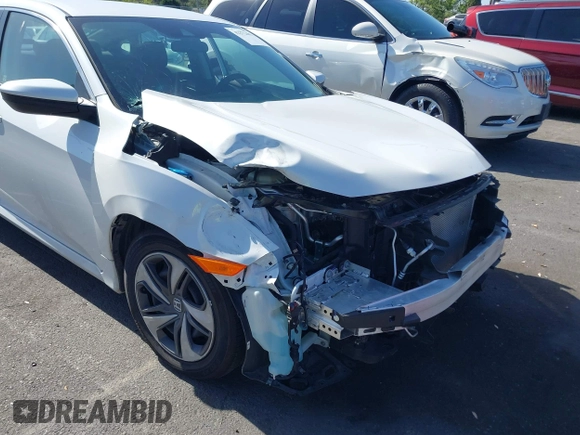 2020 Honda Civic LX z VIN 19XFC2F67LE212561, wystawiony jako IAAI lot #42272481 z przebiegiem 50 681 mil mil oraz . Historia ofert i sprzedaży dostępna na DreamBid. Obrazek 6.