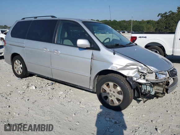 2003 Honda Odyssey EX z VIN 5FNRL18673B014271, wystawiony jako Copart lot #68613374 z przebiegiem 236 360 mil mil oraz Nie do naprawy • Non repairable. Historia ofert i sprzedaży dostępna na DreamBid. Obrazek 4.