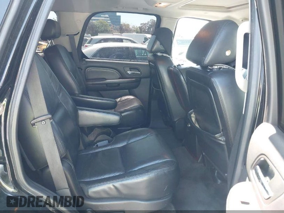2007 Cadillac Escalade z VIN 1GYFK63887R127376, wystawiony jako IAAI lot #42150261 z przebiegiem 165 849 mil mil oraz . Historia ofert i sprzedaży dostępna na DreamBid. Obrazek 7.