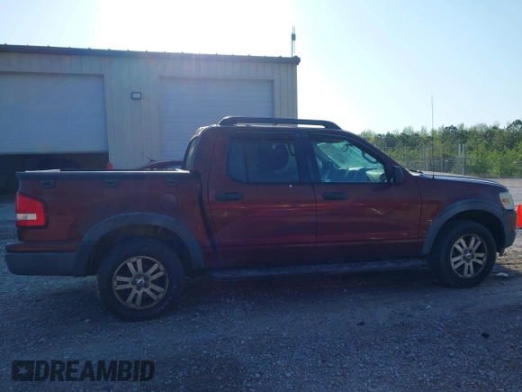 2010 Ford Explorer Sport Trac XLT z VIN 1FMEU3BE3AUA41619, wystawiony jako IAAI lot #41964282 z przebiegiem 189 377 mil mil oraz . Historia ofert i sprzedaży dostępna na DreamBid. Obrazek 13.