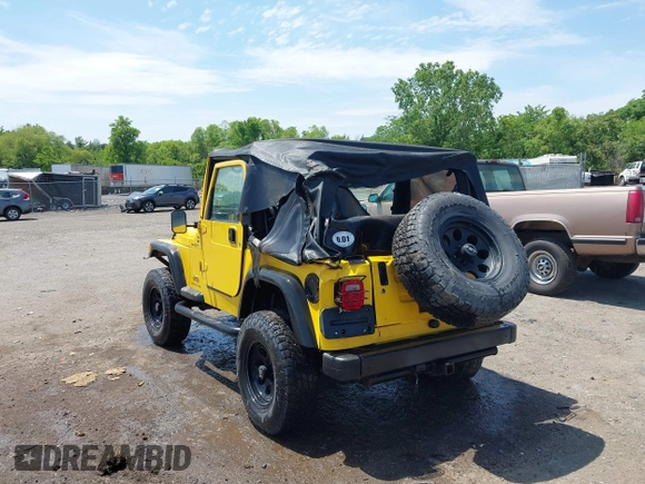2005 Jeep Wrangler Sport with VIN 1J4FA49S65P381798, listed as a IAAI auction lot 42305109 with 71,880 mi miles and . Bid and sale history available at DreamBid. Image 6.