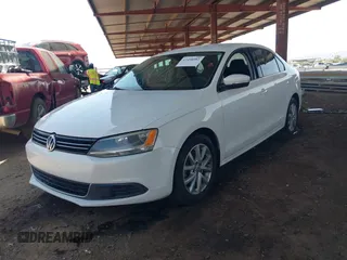 2013 Volkswagen Jetta SE z VIN 3VWDP7AJ5DM374598, wystawiony jako IAAI lot #42498082 z przebiegiem 144 285 mil mil oraz . Historia ofert i sprzedaży dostępna na DreamBid. Obrazek 17.
