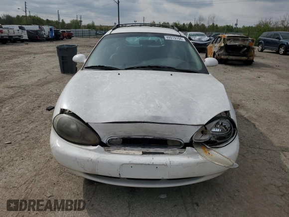1999 Mercury Sable z VIN 1MEFM58U7XA652331, wystawiony jako Copart lot #49919194 z przebiegiem 143 835 mil mil oraz Szkoda całkowita • Salvage title. Historia ofert i sprzedaży dostępna na DreamBid. Obrazek 5.