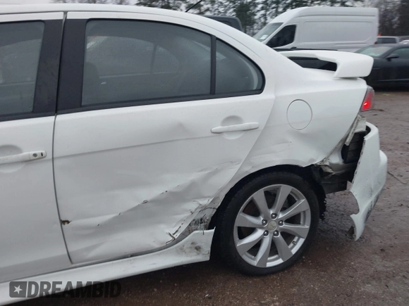 2015 Mitsubishi Lancer GT with VIN JA32U8FW5FU008618, listed as a IAAI auction lot 41290204 with 115,854 mi miles. Bid and sale history available at carsss.com. Image 6.