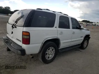 2001 Chevrolet Tahoe LT z VIN 1GNEK13TX1R176358, wystawiony jako Copart lot #56389115 z przebiegiem 241 898 mil mil oraz Szkoda całkowita • Salvage title. Historia ofert i sprzedaży dostępna na DreamBid. Obrazek 3.